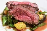 Air fryer roast beef on a white plate