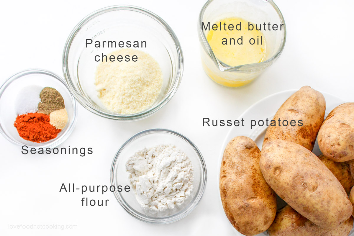 A flat-lay image of the ingredients for this air fryer potato wedge recipe. 