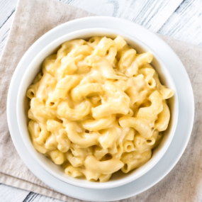One-pot stovetop mac and cheese in a white bowl.