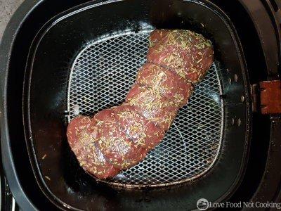 Beef tenderloin in air fryer basket