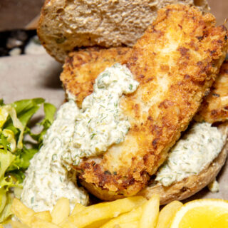 Air fryer tilapia with fries and tartare sauce.