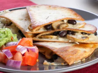 Air fryer quesadillas with black bean and mushroom filling.