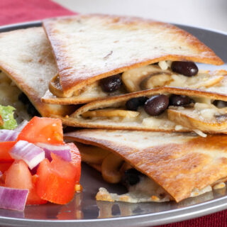Air fryer quesadillas with black bean and mushroom filling.