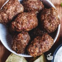 Air fryer lamb koftas in a white bowl.