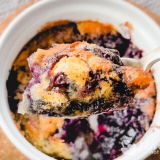 A spoonful of air fryer blueberry cobbler.