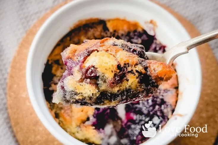 A spoonful of air fryer blueberry cobbler.