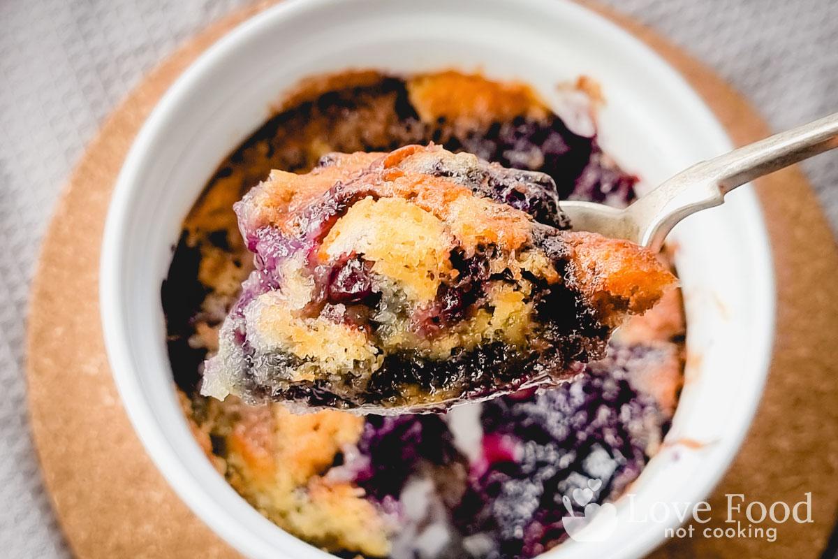 A spoonful of air fryer blueberry cobbler.