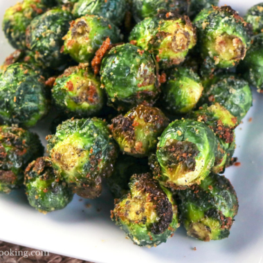 Air fryer brussels sprouts on a white plate.