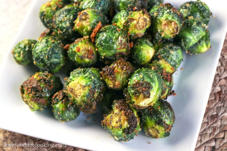 Air fryer brussels sprouts on a white plate.