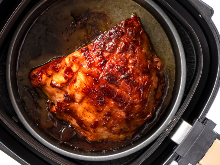 Air fryer ham in basket.