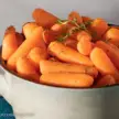Instant pot steamed carrots in a grey bowl.