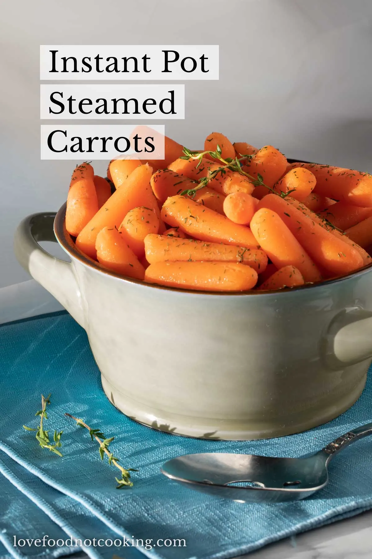 Pressure cooker carrots in a grey bowl. 