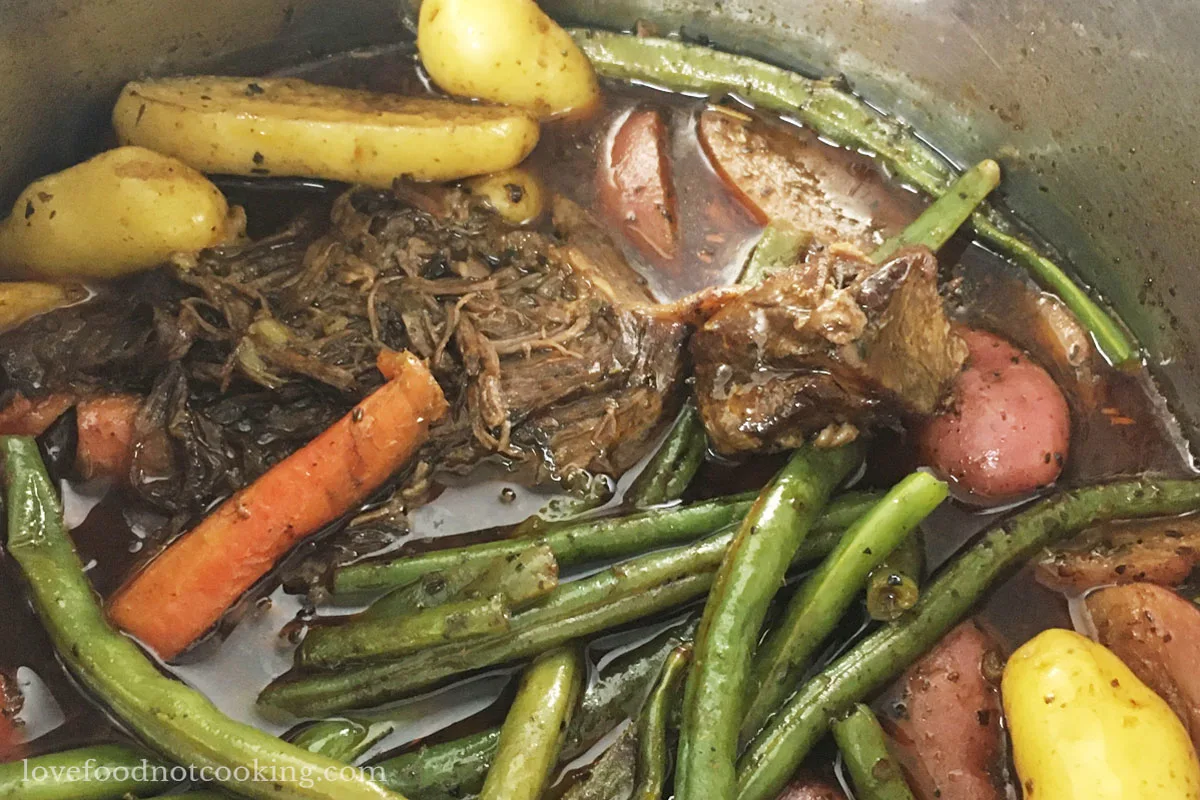 Chuck roast with vegetables in the Instant Pot. 