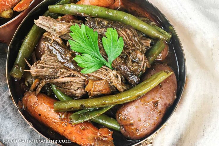 Instant Pot chuck roast with vegetables in a bowl.