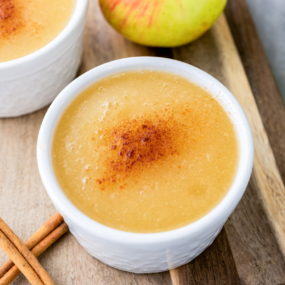 Instant Pot applesauce on a white bowl.