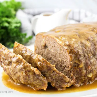 Air fryer meatloaf on a white plate.
