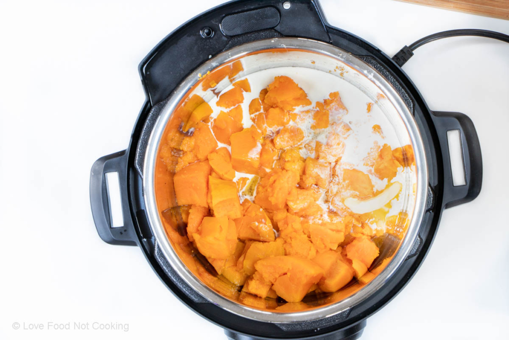 Cook sweet potato chunks in Instant Pot bowl with butter and milk. 