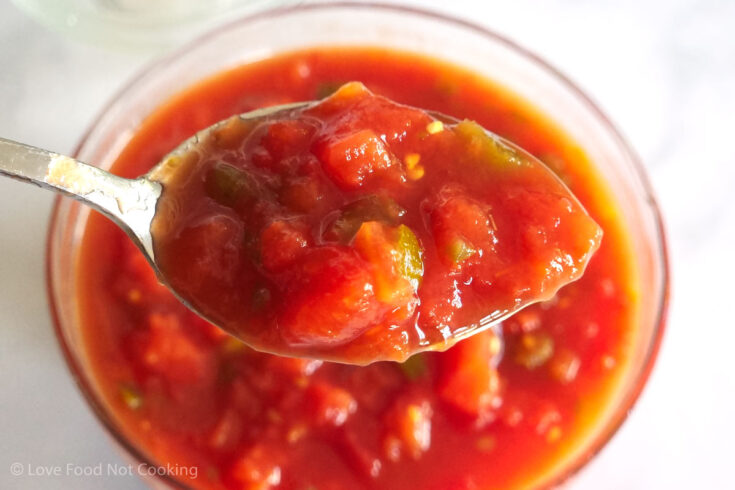 A spoonful of homemade Rotel tomatoes.