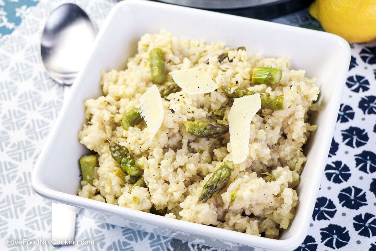 Instant Pot asparagus risotto in a white bowl. 