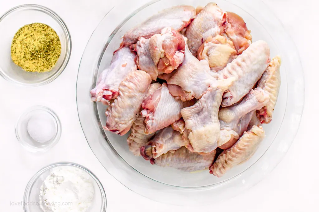 Flat lay image of the ingredients for lemon pepper air fryer chicken wings.