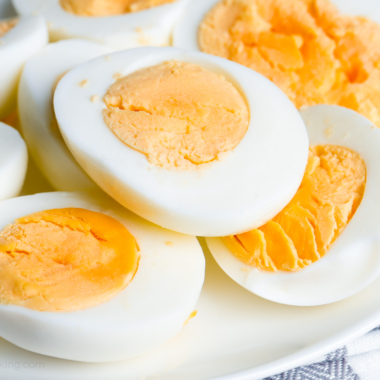 Air fryer boiled eggs on a white plate.