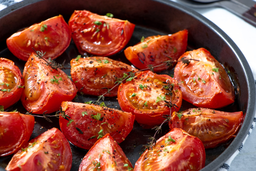 Air fryer roasted tomatoes in a baking dish.