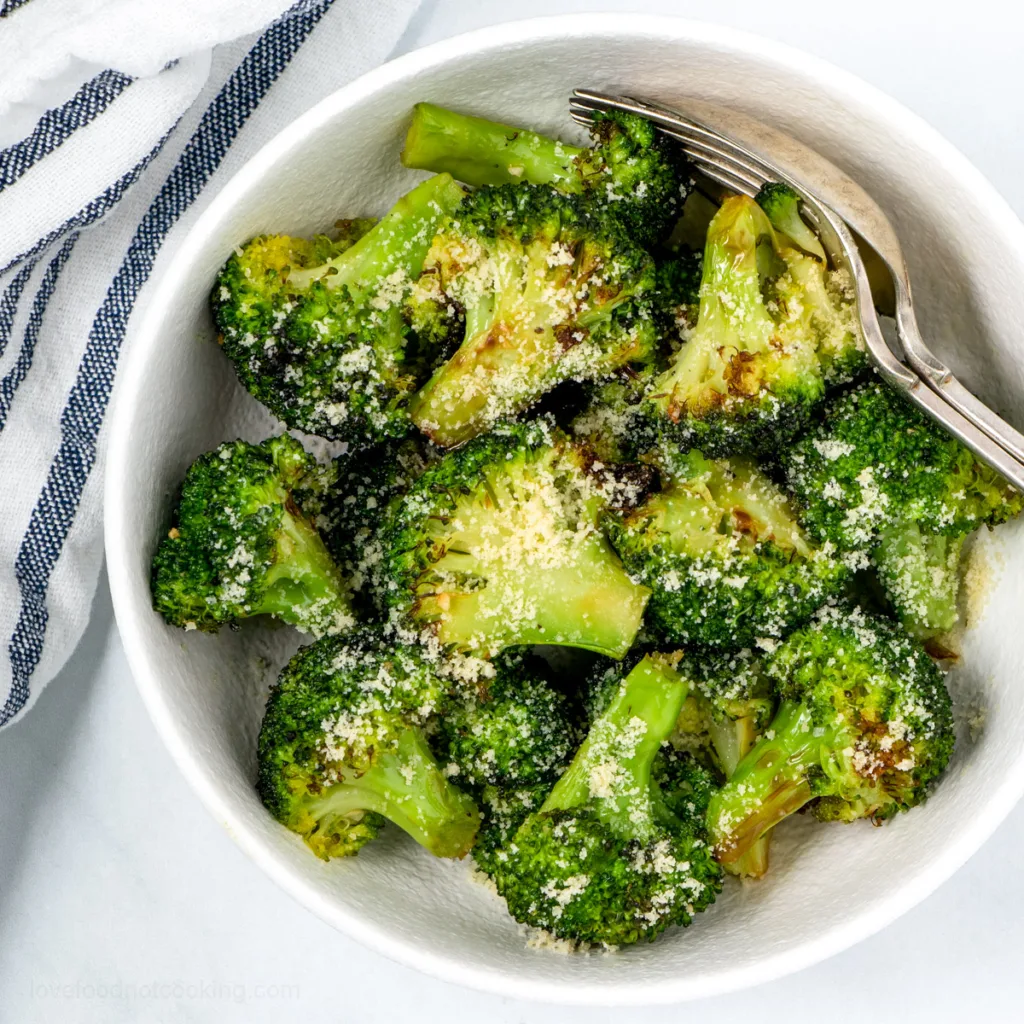 Air fried broccoli in a serving dish.