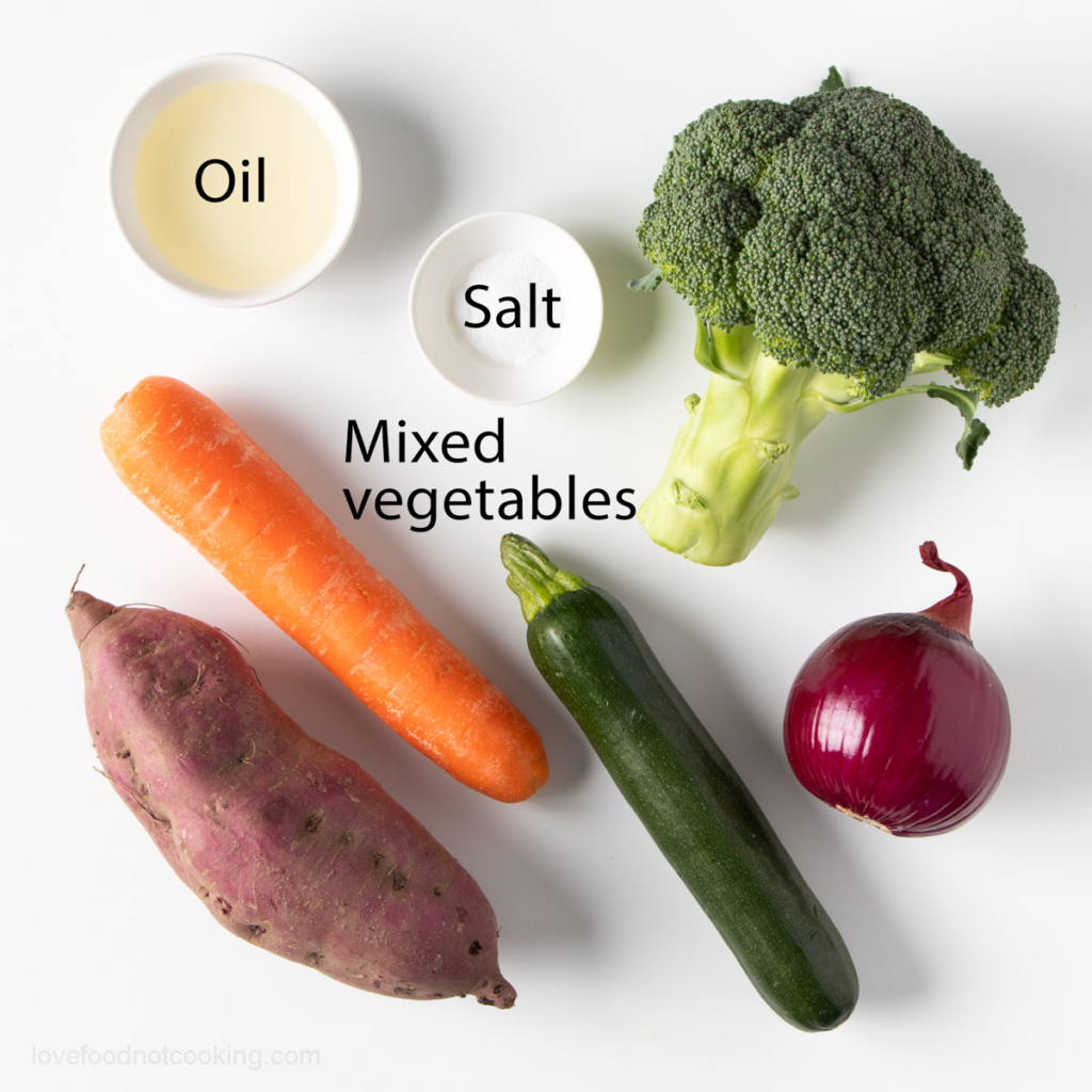 A flat-lay of the ingredients for this recipe: oil, salt and mixed vegetables.