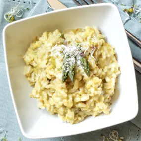 Instant Pot asparagus risotto in a white bowl.