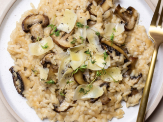 Instant Pot mushroom risotto on a white plate.