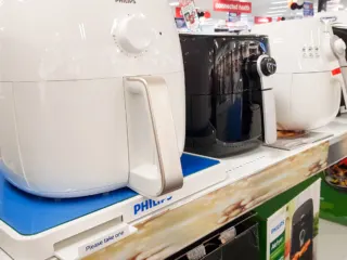 A range of air fryers available in a store.