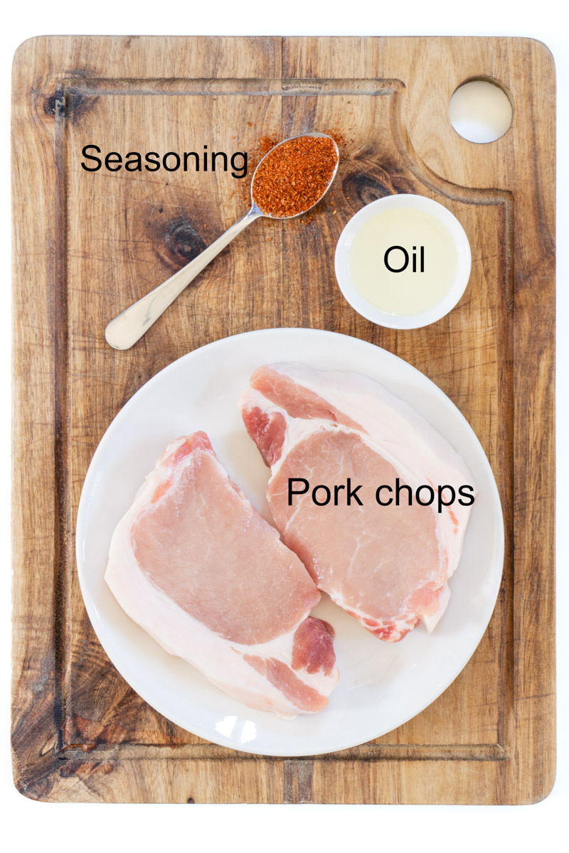 A flat-lay of the ingredients for this air fryer pork chop recipe. 