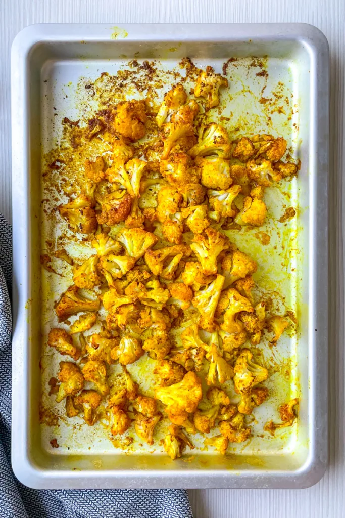 Spicy roasted cauliflower on a sheetpan.