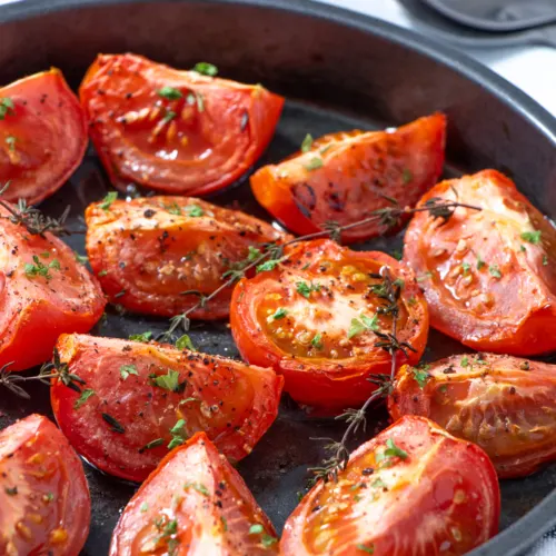 Air fryer tomatoes in a baking dish.
