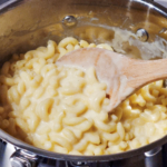 Mac and cheese in a saucepan.