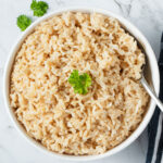 Instant Pot brown rice in a white bowl.