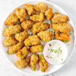 Air fryer popcorn chicken on a white plate.