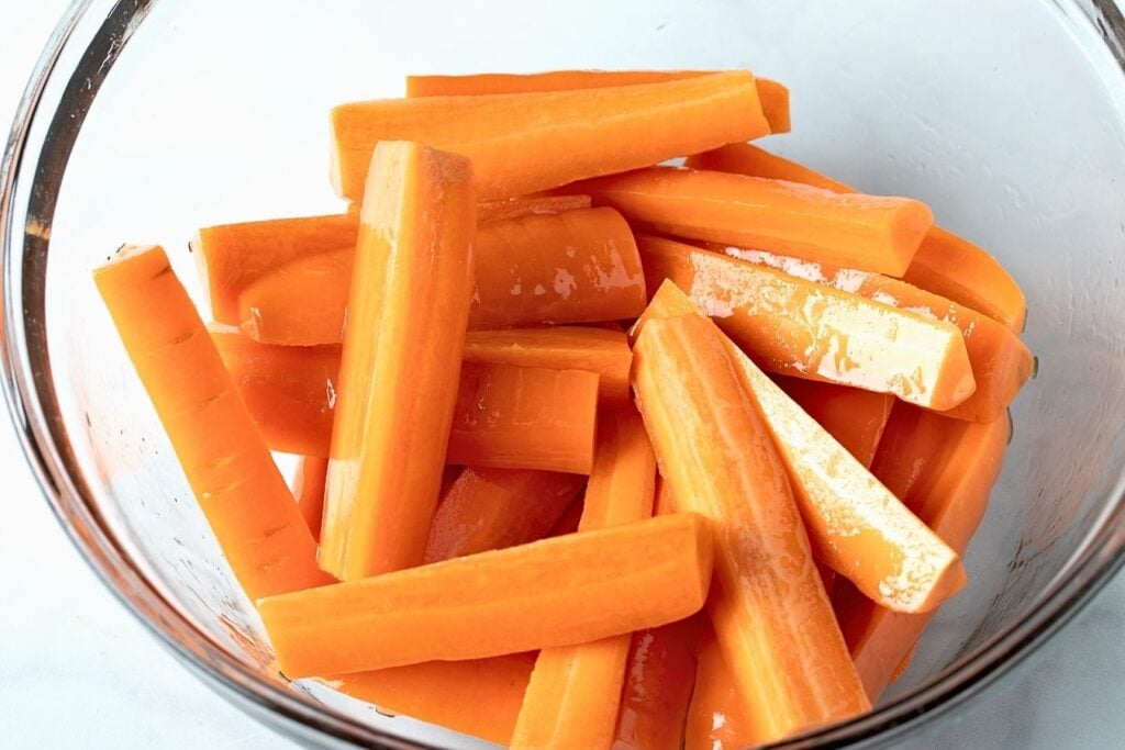 Carrots tossed with oil. 