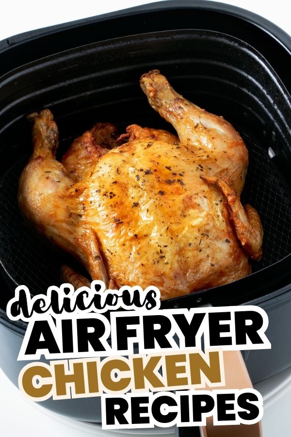 Whole chicken in air fryer basket.